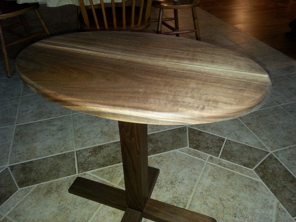 Small Pedestal Table How do I Attach Legs to the Single Post